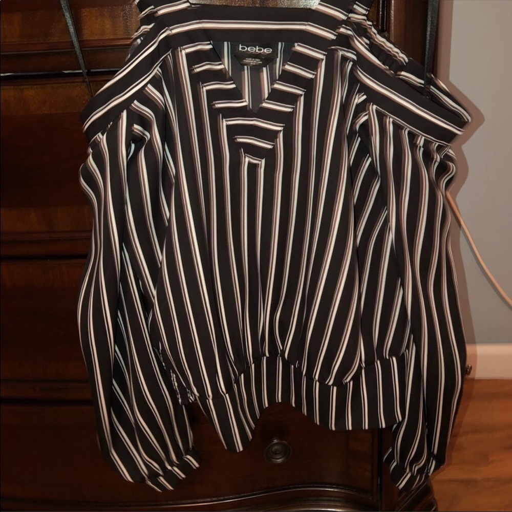 Size medium. Bebe cold shoulder top